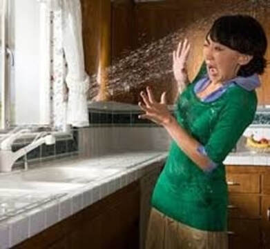 woman with plumbing leak